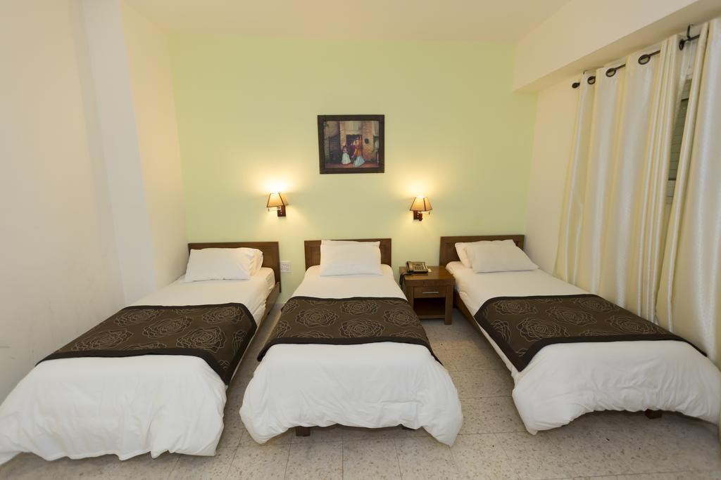 Angel Hotel Belém Quarto foto